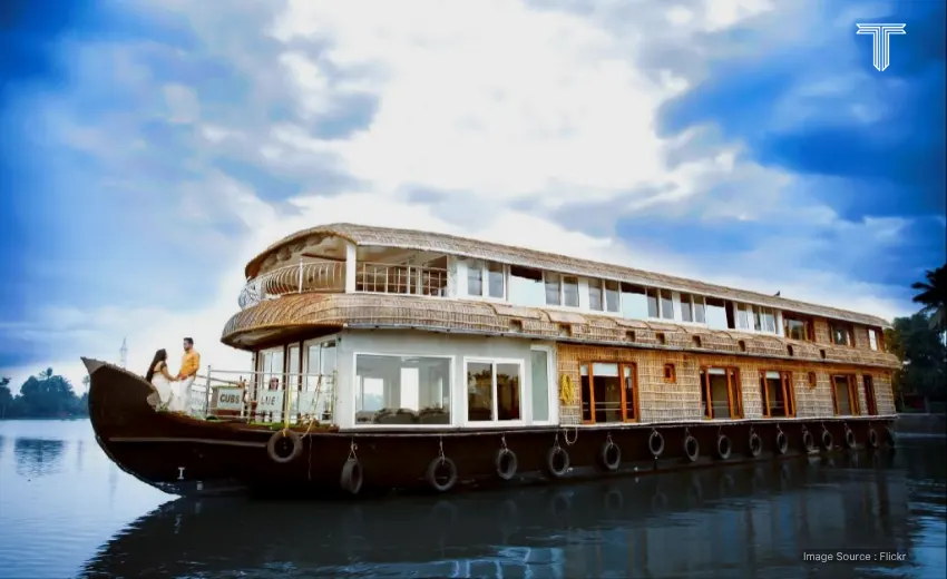 Houseboat cruising across the palm-grove backwaters of Alleppey, Kerala, promising a leisure luxury holiday experience one of the best place to go in India.
